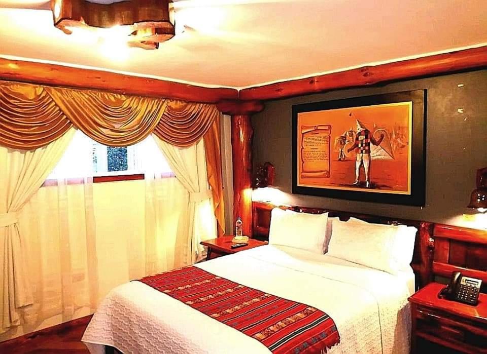 Hostal Huasicama Latacunga Habitación foto